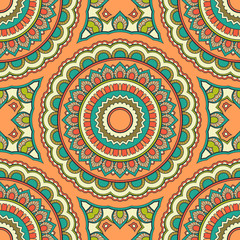 Decorative colorful ethnic seamless pattern for fabric or wrapping in oriental style. Hand drawn illustration