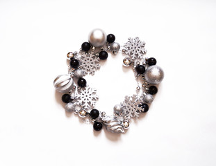 Paper flower poinsettia and spruce branches.