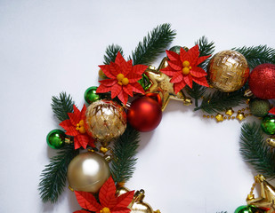 Paper flower poinsettia and spruce branches.