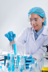 researcher working with glassware, glass equipment in scientific genetic laboratory. Healthcare and biotechnology