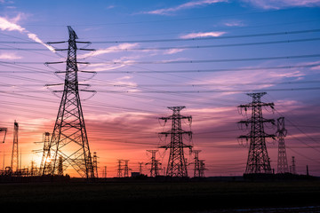 Silhouette of Power Supply Facilities at Sunset