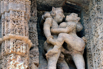 Konark Sun Temple in Odisha, India. Erotism and origin of kamasutra in Indian sculpture. Erotic sculpture of Konark temple.