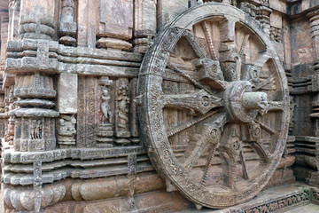 Fototapeta na wymiar Ancient chariot Wheel, Konark Sun Temple, Orissa. Konark Sun Temple is a 13th-century CE sun temple at Konark about 35 km northeast from Puri on the coastline of Odisha, India.