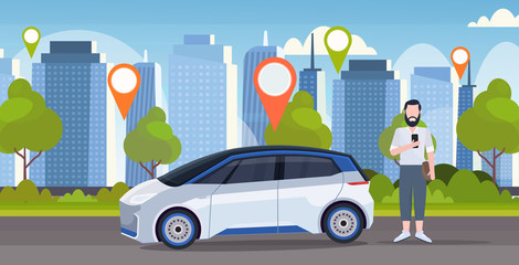Naklejka premium man using online ordering taxi car sharing concept mobile transportation carsharing service location geo tag modern city street cityscape background horizontal