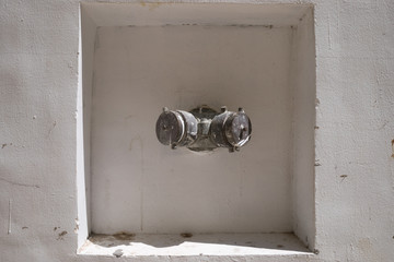 A fireplug on the wall