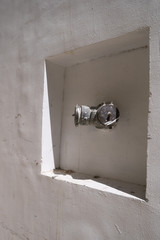 A fireplug on the wall