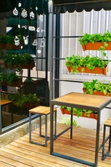 outdoor tables and chairs in coffee shops