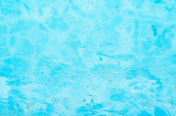 Fototapeta na wymiar Water waves in the pool.