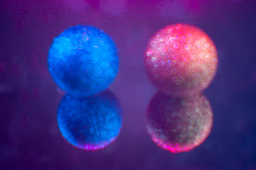 Colored Christmas balls to decorate Christmas fir. Natural lighting effects. Shallow depth of field. Selective focus, handmade art of nature. Christmas Eve landscape spruce