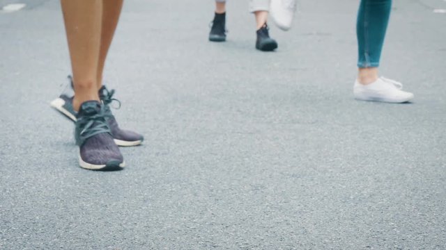 Seeing Kids legs and feets in shoes dancing the shuffle dance on the street