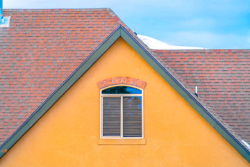 Fototapeta premium Close up of exterior of a home with blue sky in the background