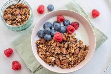 Granola with yogurt and berries for healthy breakfast