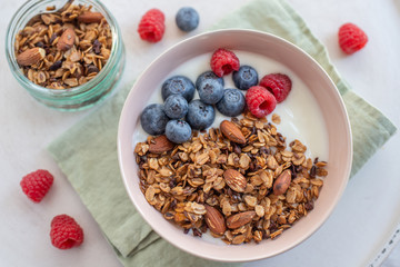 Granola with yogurt and berries for healthy breakfast