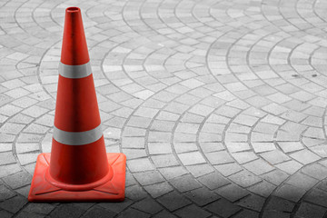 Traffic cone on  sidewalk