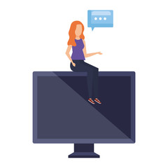 woman seated in desktop with speech bubble