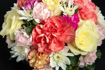 bunch of colorful flowers on black