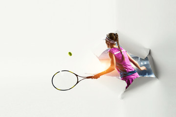 Paper torn hole effect with female tennis player. Mixed media