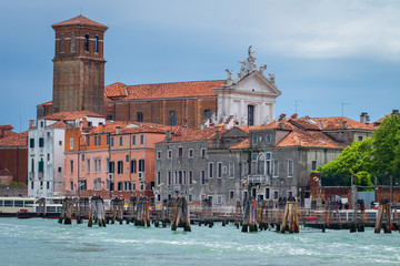 Fototapeta na wymiar Venice building exterior on Ferry pier Fondamente Nove, Italy