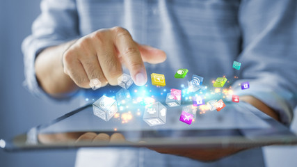 businessman  working with tablet modern technology  with social media icons on screen