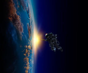 Astronaut in space on planet orbit.