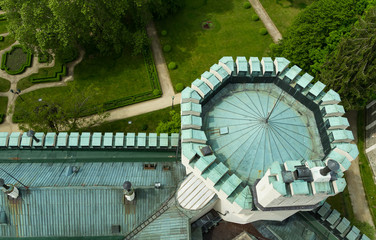 Top view to roof of castle Hluboka nad Vltavou with garden