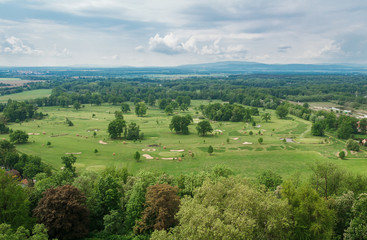 Aerial view to golf course with cloudy sky in Hluboka nad Vltavou, Czech republic