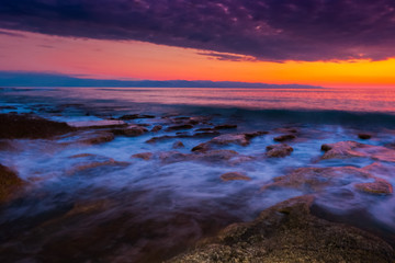Fototapeta na wymiar multicolored sunset over the sea