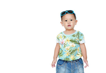 Portrait little Asian baby boy wearing a flowers summer dress and sunglasses isolated on white background. Summer and fashion concept.
