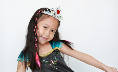 Portrait of happy little Asian girl dressed with a fantasy outfit on white background.