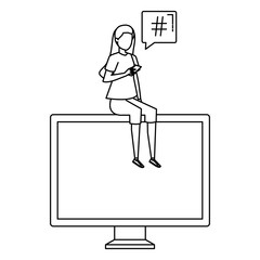 woman using smartphone seated in desktop with speech bubble