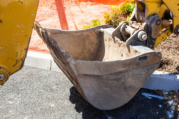 Shovel equipment at a construction site, part of a tractor vehicle