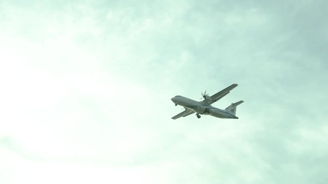 Koh Samui / Thailand - 05 25 2019: Landing a screw aircraft at Samui Airport