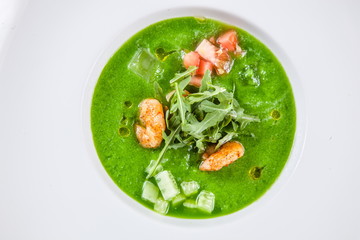 Gazpacho with Shrimps on white plate
