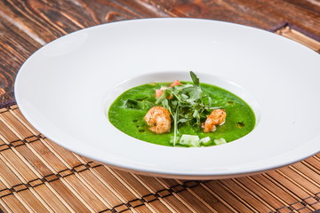 Gazpacho with Shrimps on white plate