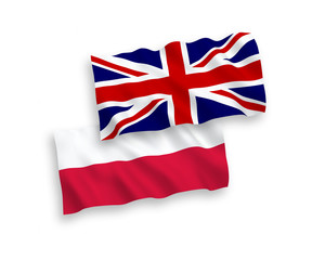 National vector fabric wave flags of Poland and Great Britain isolated on white background. 1 to 2 proportion.