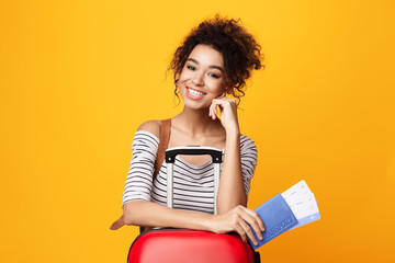 Afro Female Tourist With Luggage And Passport