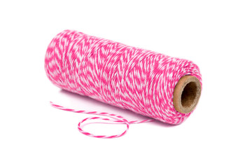 spool of thread pink colors