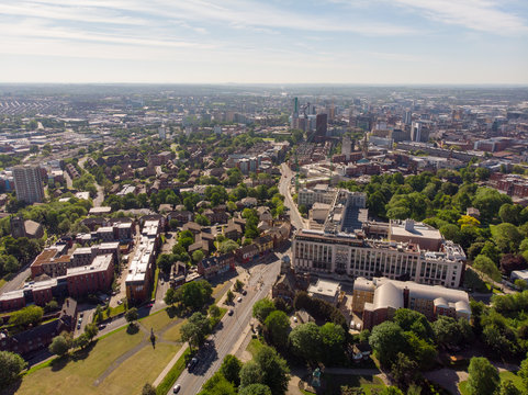 Aerial photo of the town known as Headingley in Leeds West Yorkshire, you can see the Leeds university in the background and the Leeds City Centre taken with a drone on a beautiful sunny day.