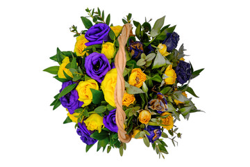 Fototapeta premium A bouquet of blooming roses and the dead. The process of decay of all living things. Fresh and withered plants. Top view of the blue and yellow flowers in the basket. Isolate on white background.