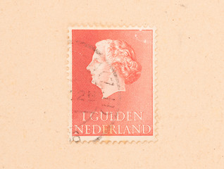 THE NETHERLANDS 1980: A stamp printed in the Netherlands shows the queen, circa 1980
