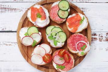 Top view on different sandwiches, flat lay