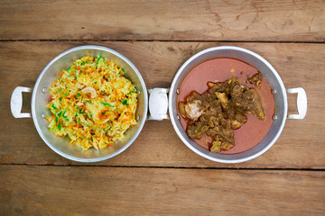 Red Goat biryani Curry on wood table