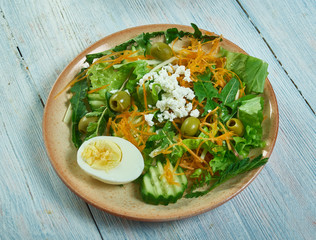 Spring salad with herbs, vegetables and eggs