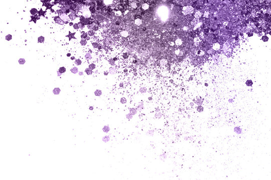 Purple glitter and glittering stars on white background in vintage colors