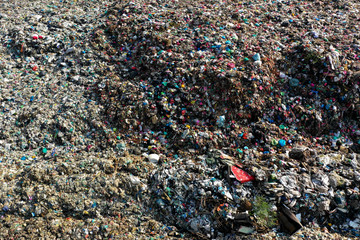 Plastic garbage dumped in landfill. Plastic trash is dumped in Malaysia. Environmental problem because of no recycling