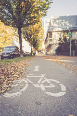 Obraz premium Cycle track, autumn, bike symbol on the floor