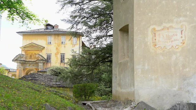 A beautiful travel tour at the Sacred Mountain of Varallo, a christian devotional complex, a unesco world heritage si in Italy. Zoom out 4k footage