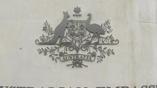 Sign Outside Australian Embassy in Bangkok Thailand. Zoom In on Coat of Arms