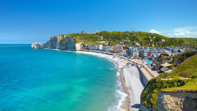 Picturesque panoramic landscape on the cliffs of Etretat. Natural amazing cliffs. Etretat, Normandy, France, La Manche or English Channel. Coast of the Pays de Caux area in sunny summer day. France