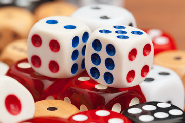 Dice on a wooden table. Concept for business risk.